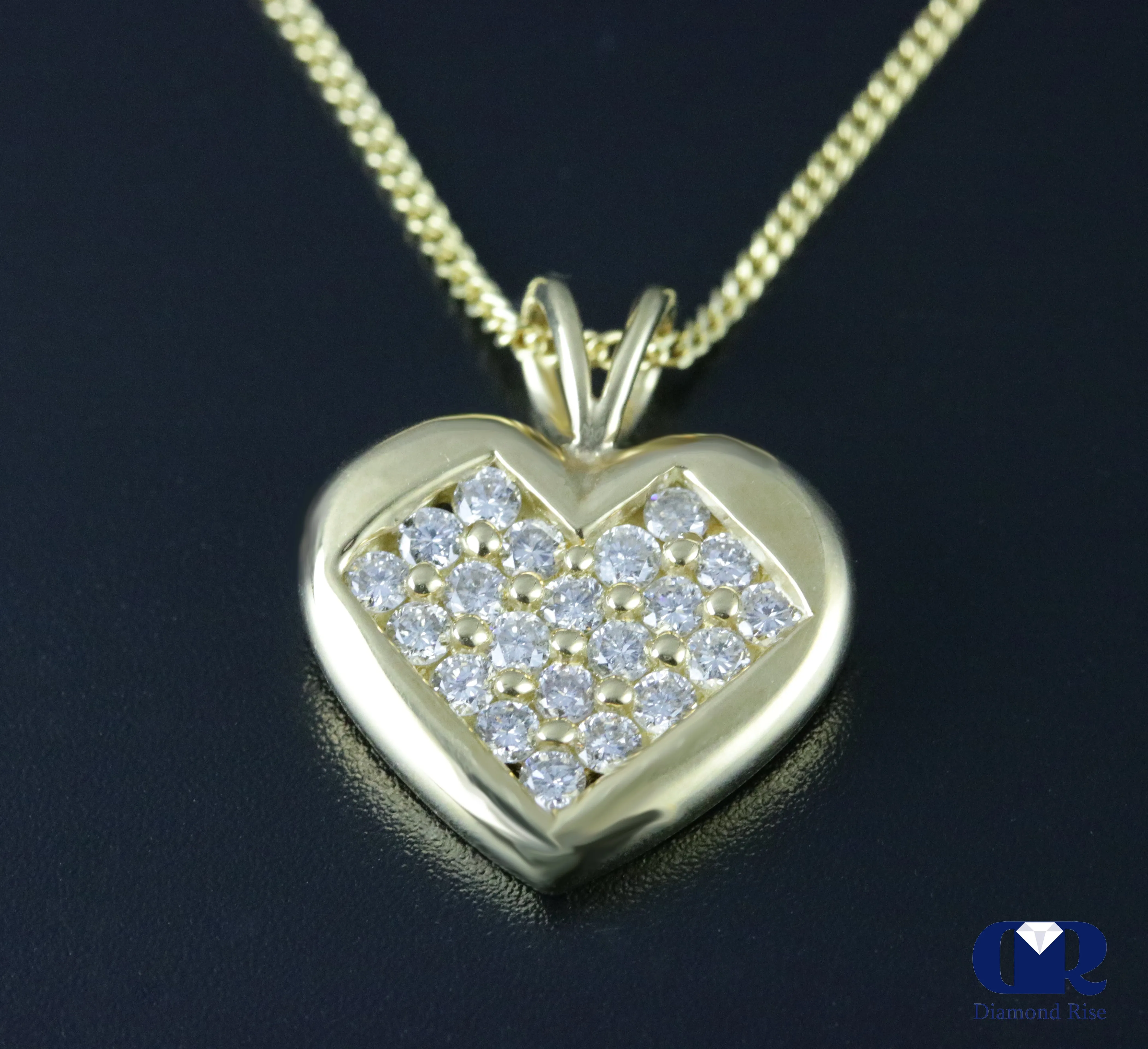 0.65 Carat Round Cut Diamond Heart Pendant In 14K Yellow Gold