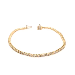 14 Karat Yellow Gold and Diamond 7" in line Tennis Bracelet