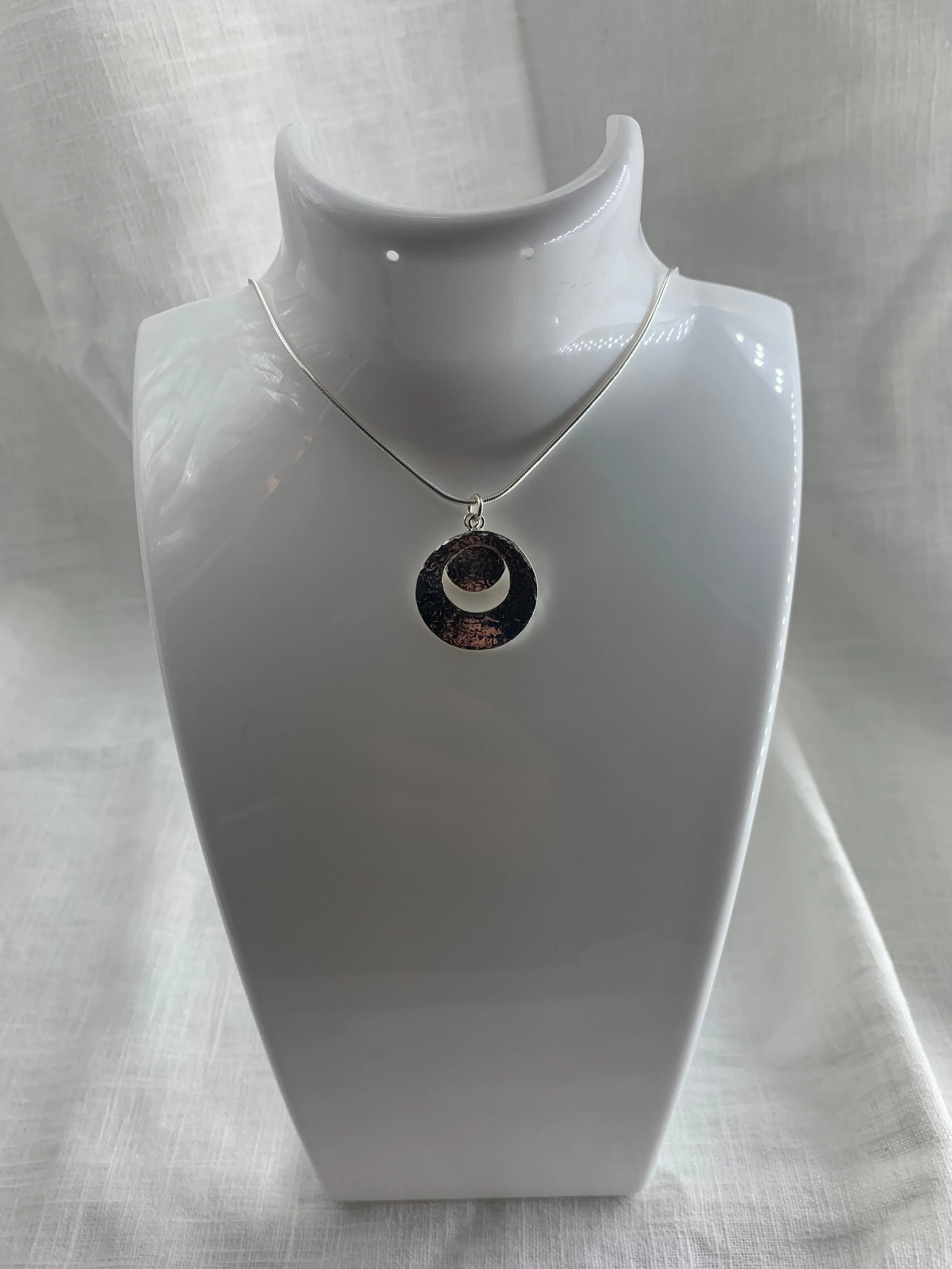 Cut-Out Silver Circles Pendant