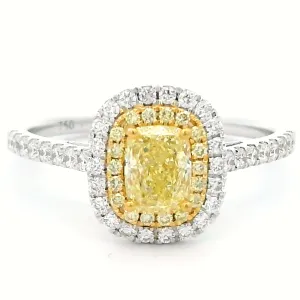 Exquisite Fancy Yellow Diamond Halo Ring in 18k Gold.