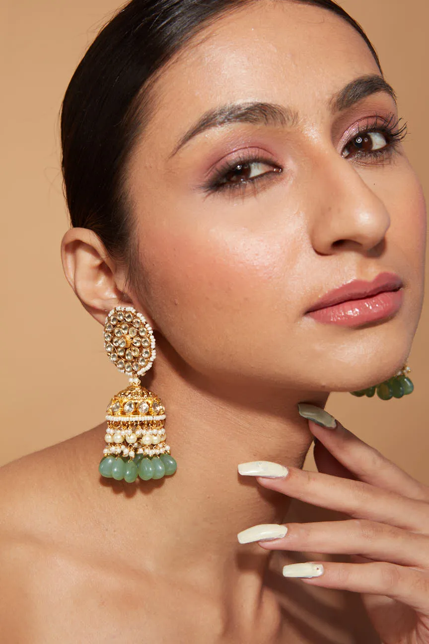 Gold Plated Kundan Studded With Green Bead Drop Jhumka Earrings