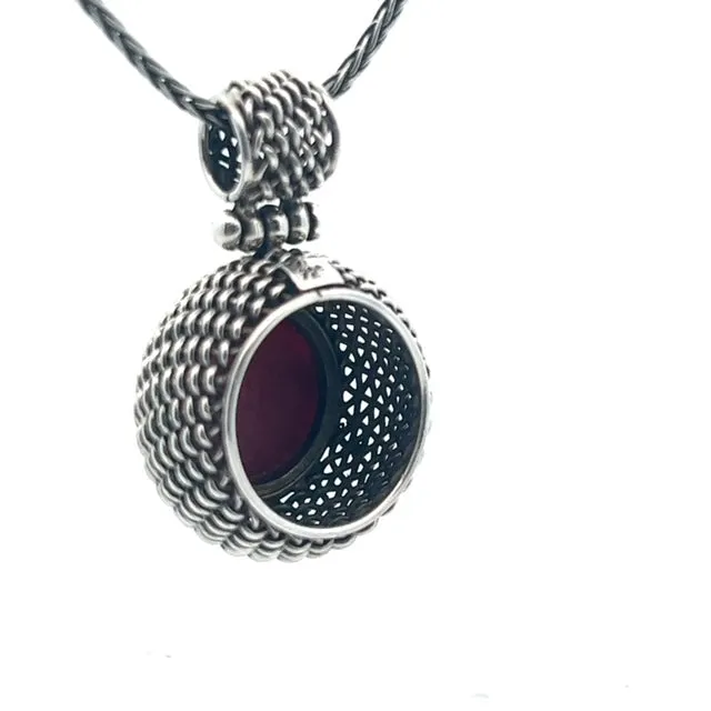 Natural Sponge Coral Pendant Set in Weaved Sterling Silver