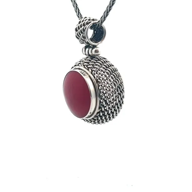 Natural Sponge Coral Pendant Set in Weaved Sterling Silver