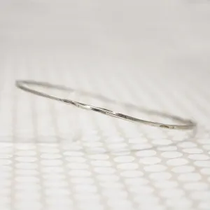 The Endless Twist Round Bangle in Sterling from Allie B.